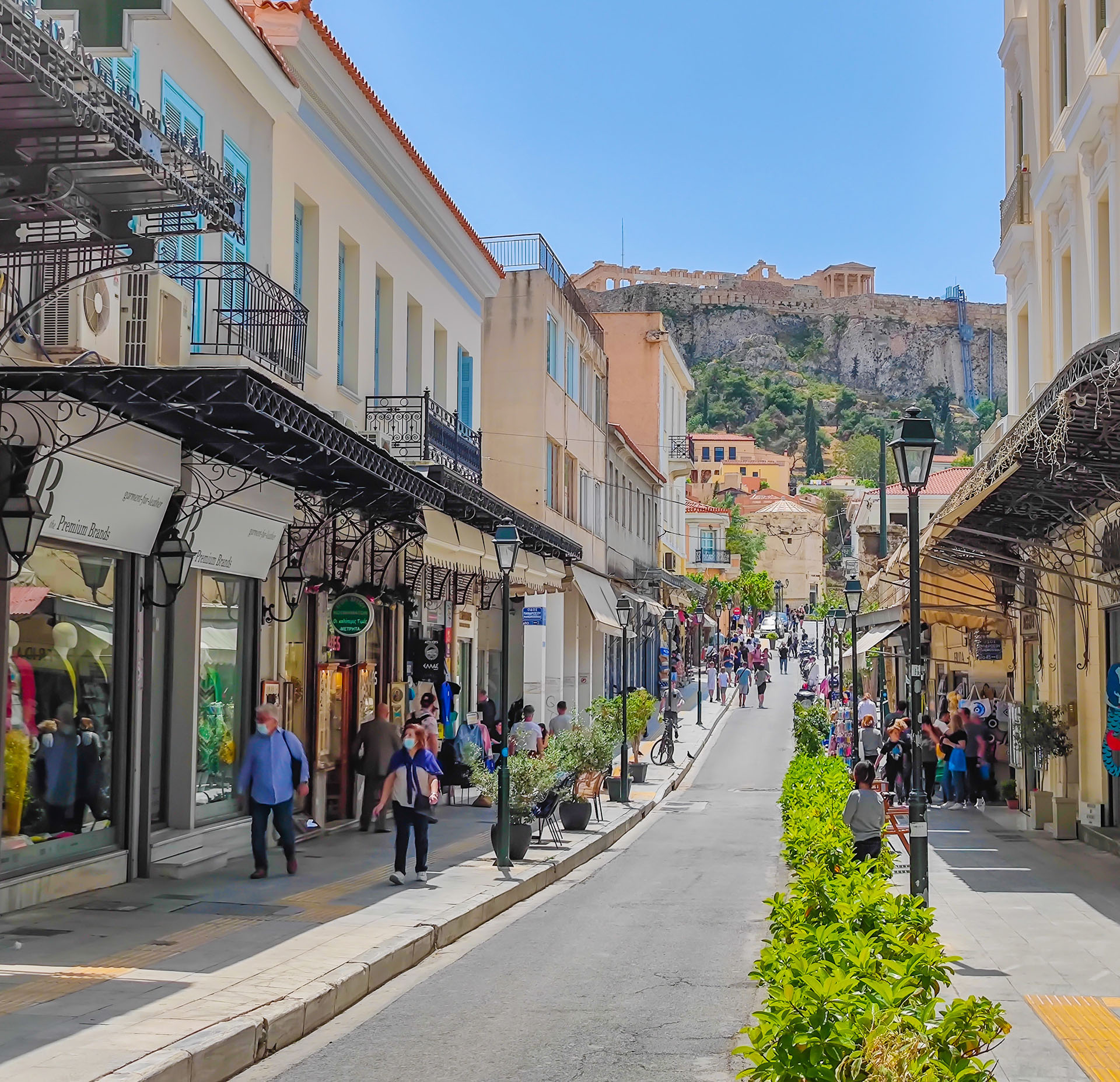 Beautiful street in Athens leading to the Acropolis on the hill